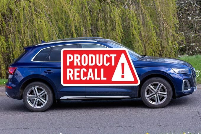 A Blue 2023 Audi Q7 SUV Cruises on Pavement